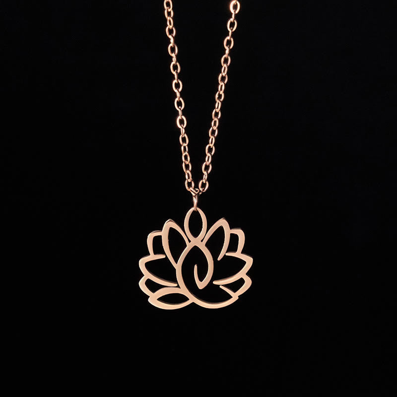 Hollow Lotus Necklace – Rose gold lotus pendant on black background, enlightenment spiritual jewelry