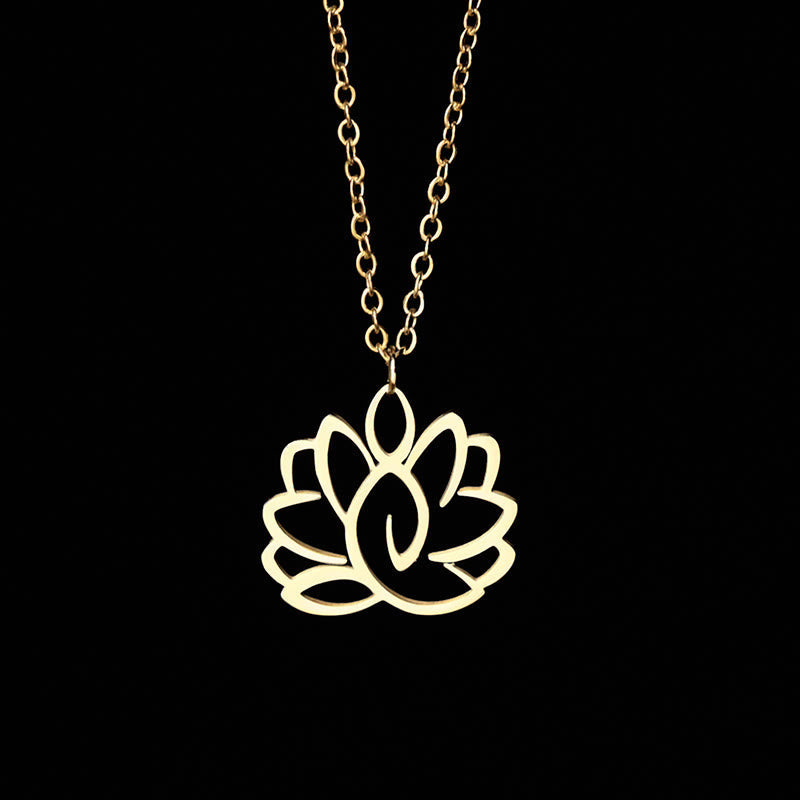 Hollow Lotus Necklace – Gold openwork lotus pendant on chain against black, enlightenment spiritual jewelry