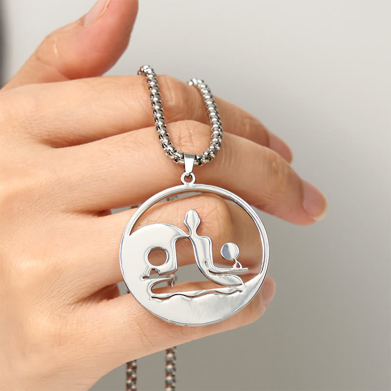 Yin Yang Buddha Stainless Steel Necklace – held hand light background silver Buddha yin yang pendant scale, hand-held
