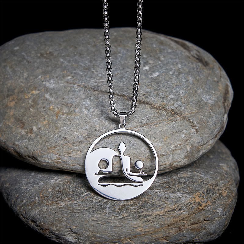 Yin Yang Buddha Stainless Steel Necklace – on gray stones dark background silver Buddha yin yang pendant, natural-light