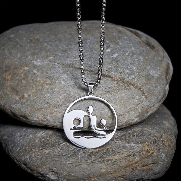 Yin Yang Buddha Stainless Steel Necklace – on gray stones dark background silver Buddha yin yang pendant, natural-light