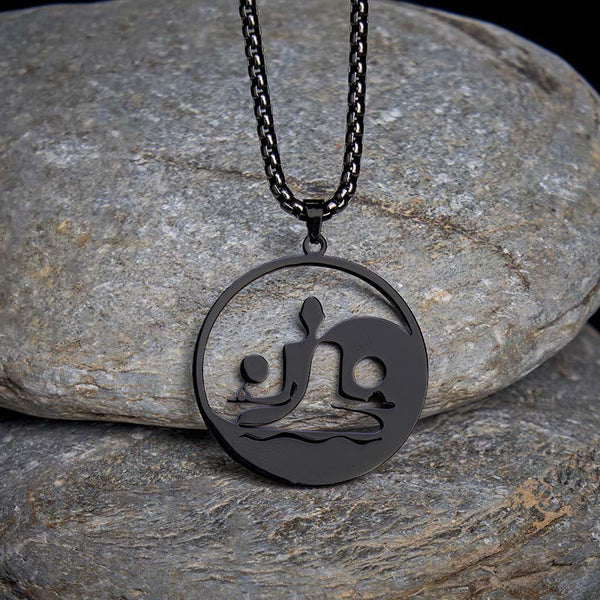 Yin Yang Buddha Stainless Steel Necklace – on gray stones dark background black Buddha yin yang pendant, natural-light