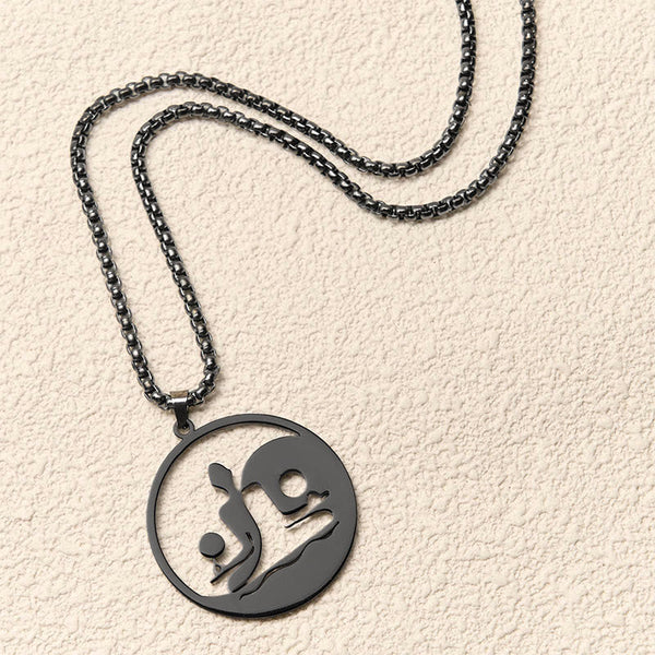 Yin Yang Buddha Stainless Steel Necklace – flatlay cream texture black chain round Buddha yin yang pendant, flat-lay