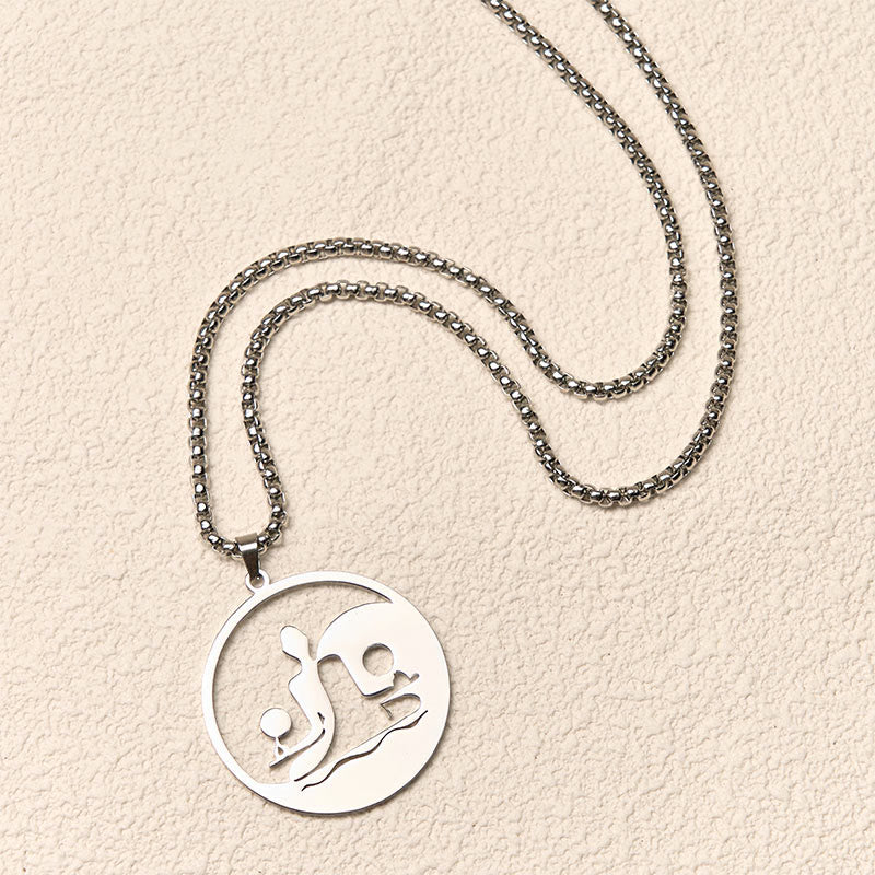 Yin Yang Buddha Stainless Steel Necklace – flatlay cream texture silver chain round Buddha yin yang pendant, flat-lay