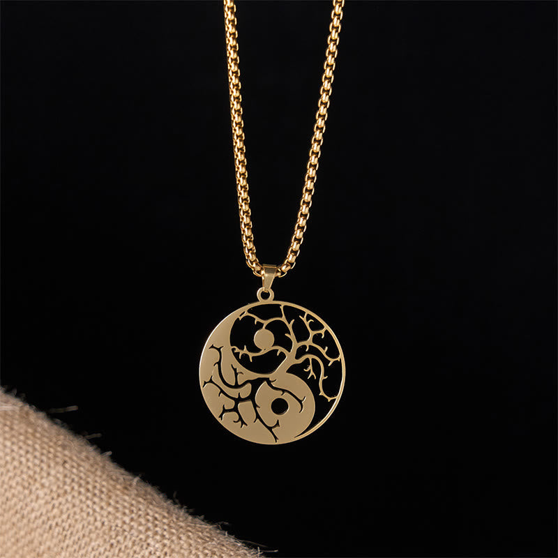 Yin Yang Branches Necklace – Gold pendant on black background, yin yang necklace