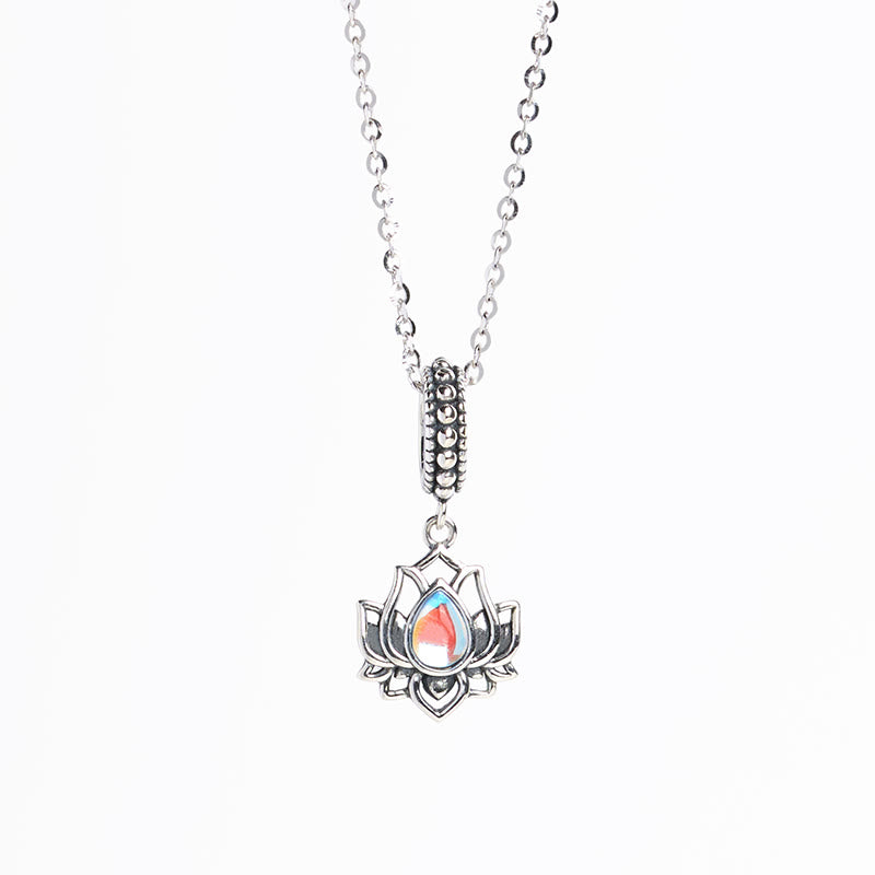 Sterling silver lotus necklace with color-changing moonstone teardrop, oxidized vintage finish, cable chain