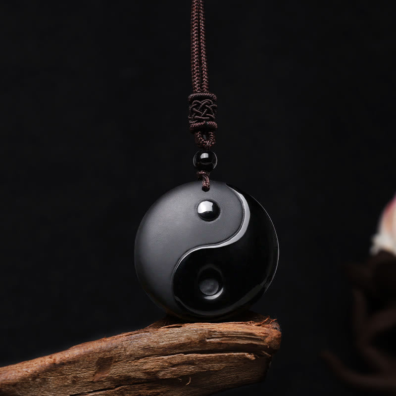 Black Obsidian Yin Yang Necklace – On dark weathered wood, obsidian protection necklace