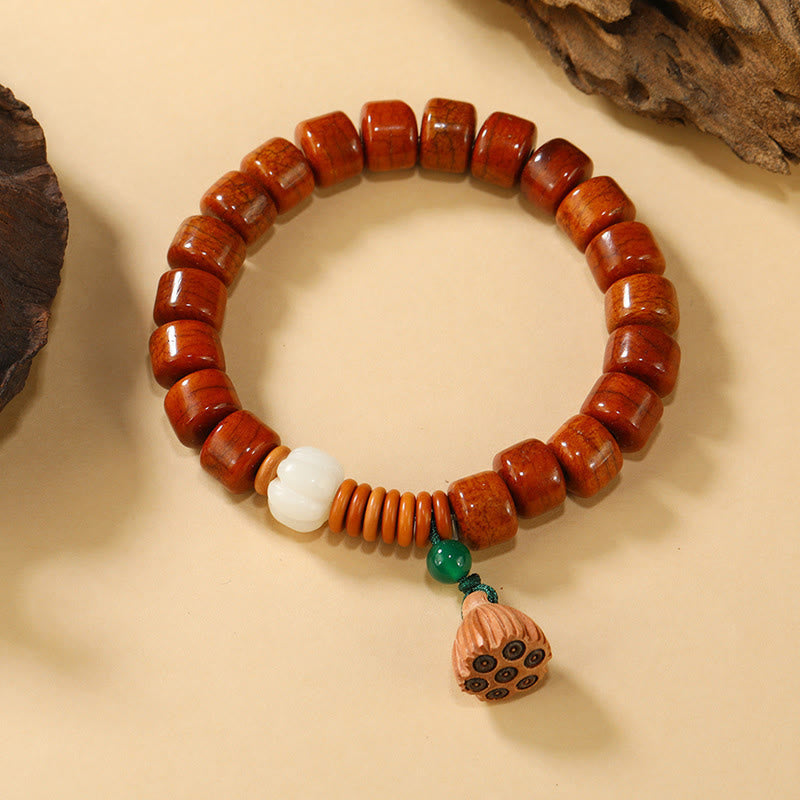 Bone Beads Lotus Peace Buckle Enlightenment Bracelet – lotus seed pod pendant dangling from green bead, handcrafted