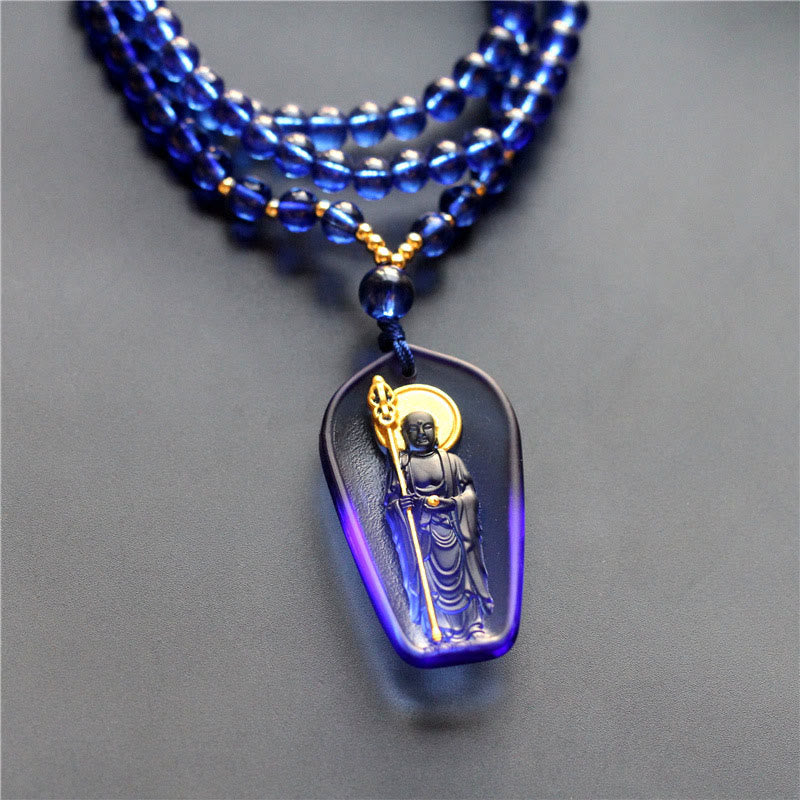 Tibetan Liuli Crystal Ksitigarbha Necklace – blue pendant on blue beaded chain, gold accents, front