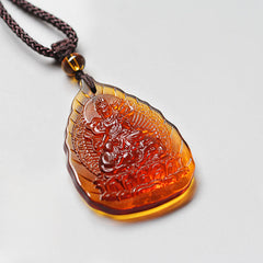 Liuli Crystal Chinese Zodiac Natal Buddha Protection Leaf Necklace – amber liuli leaf pendant Buddha riding lion, front