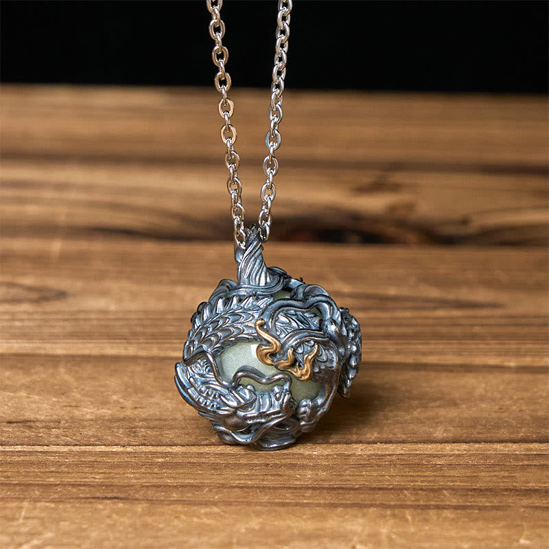 Copper Dragon Pendant Necklace – oxidized silver dragon cage with luminous jade bead on cable chain, Strength