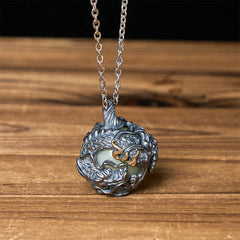 Copper Dragon Pendant Necklace – oxidized silver dragon cage with luminous jade bead on cable chain, Strength