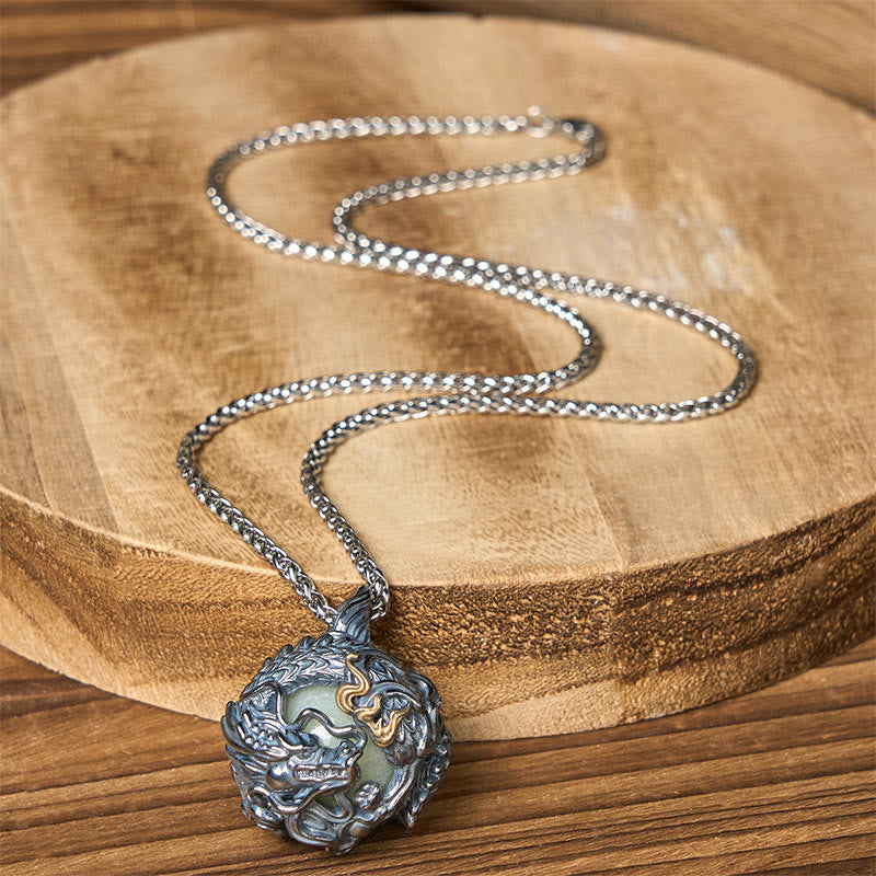 Copper Dragon Pendant Necklace – dragon orb on wooden cross-section with box chain drape, Prosperity