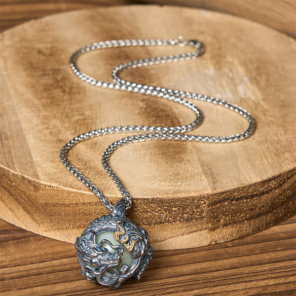 Copper Dragon Pendant Necklace – dragon orb on wooden cross-section with box chain drape, Prosperity