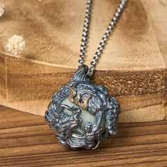 Copper Dragon Pendant Necklace – double dragon chasing pearl orb on book with dried flowers, Luck