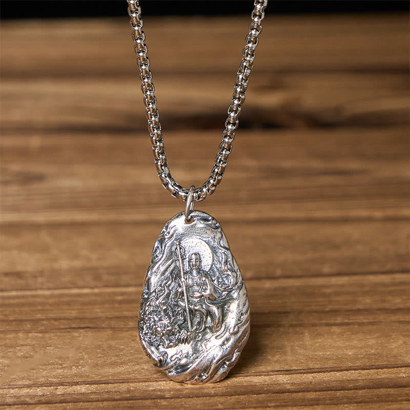 Copper Ksitigarbha Pendant Necklace – front closeup on box chain, wood table, studio light