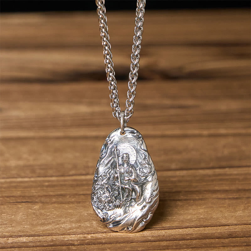 Copper Ksitigarbha Pendant Necklace – front view on wheat chain, textured wood background