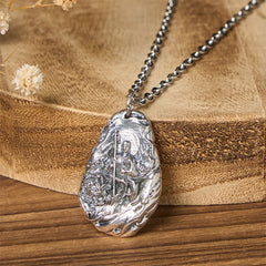 Copper Ksitigarbha Pendant Necklace – front closeup on box chain with dried flowers, studio detail