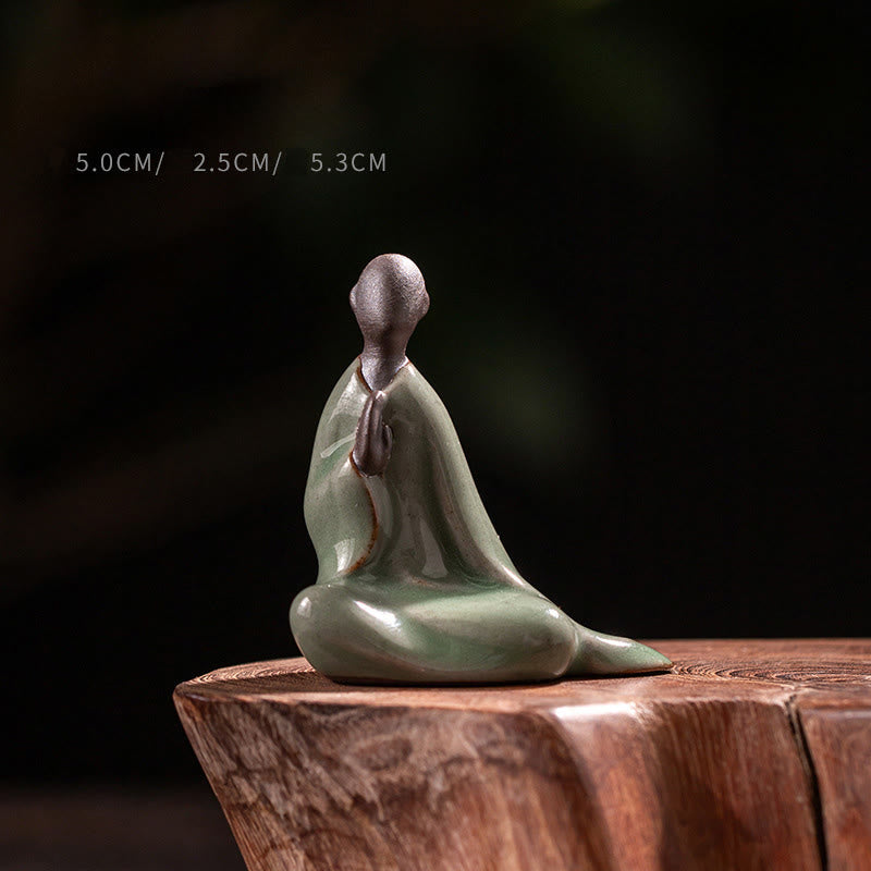 Small Ceramic Formless Buddha Prayer Statue – celadon seated prayer figure on wood base, front studio