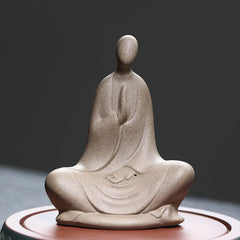 Ceramic Formless Buddha Prayer Statue – front view, gray ceramic with hands in prayer mudra, on round stand, zen home decor