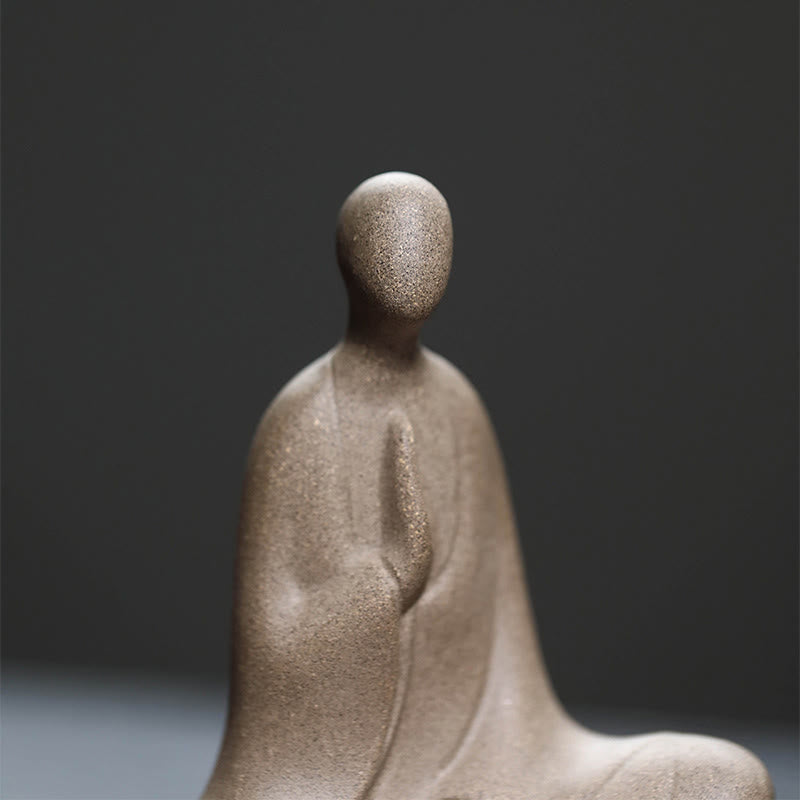 Ceramic Formless Buddha Prayer Statue – macro headshot of faceless figure, speckled gray finish, minimalist spiritual sculpture