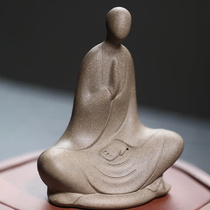 Ceramic Formless Buddha Prayer Statue – front closeup of prayer gesture, speckled gray ceramic texture, robe folds detail