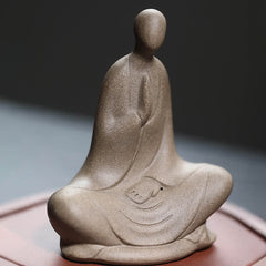 Ceramic Formless Buddha Prayer Statue – front closeup of prayer gesture, speckled gray ceramic texture, robe folds detail