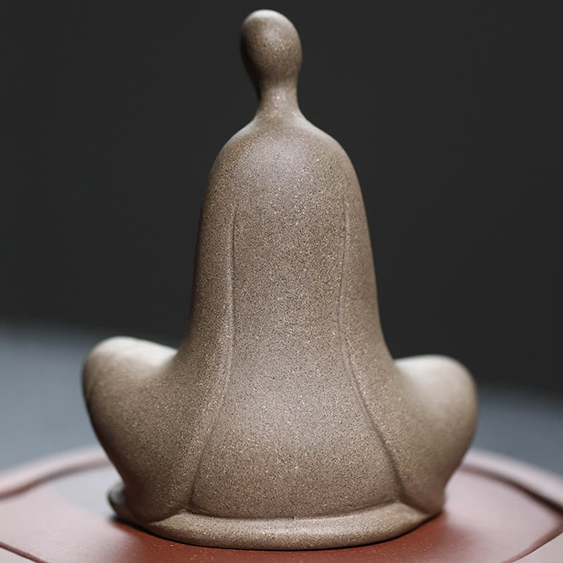 Ceramic Formless Buddha Prayer Statue – back macro showing robe seam lines, gray granular texture, meditative silhouette detail