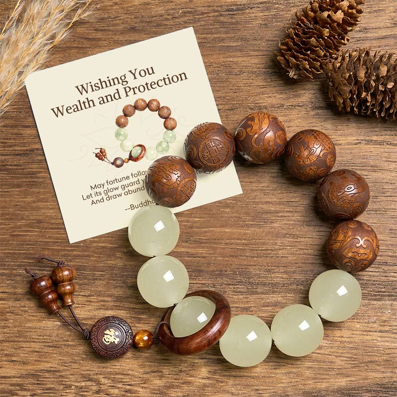 Sappan Wood Pixiu Bracelet with Glowstone & Fu Charm – Wood bead bracelet with glowstone and Fu charm on wood table with card