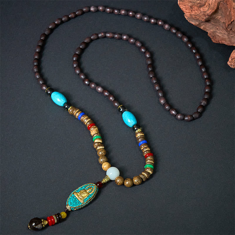 Vintage Nepal Avalokitesvara Necklace – full length flatlay on dark background with turquoise stones, artisan craft