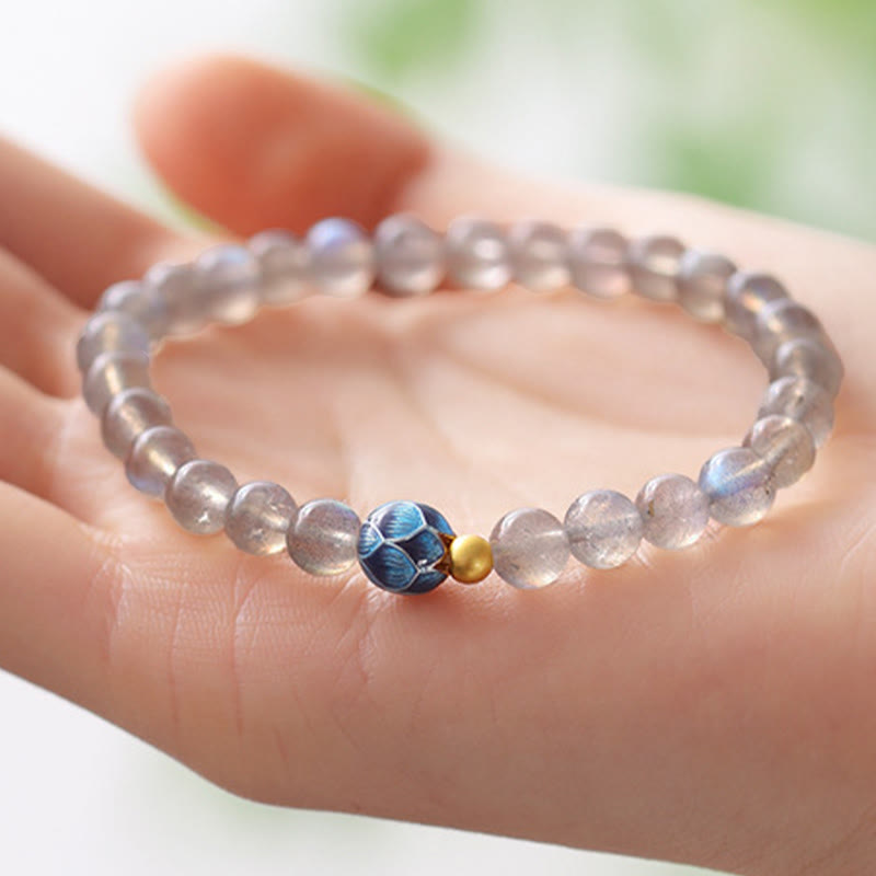 Natural Moonstone Lotus Bracelet – moonstone lotus bead on palm, natural light