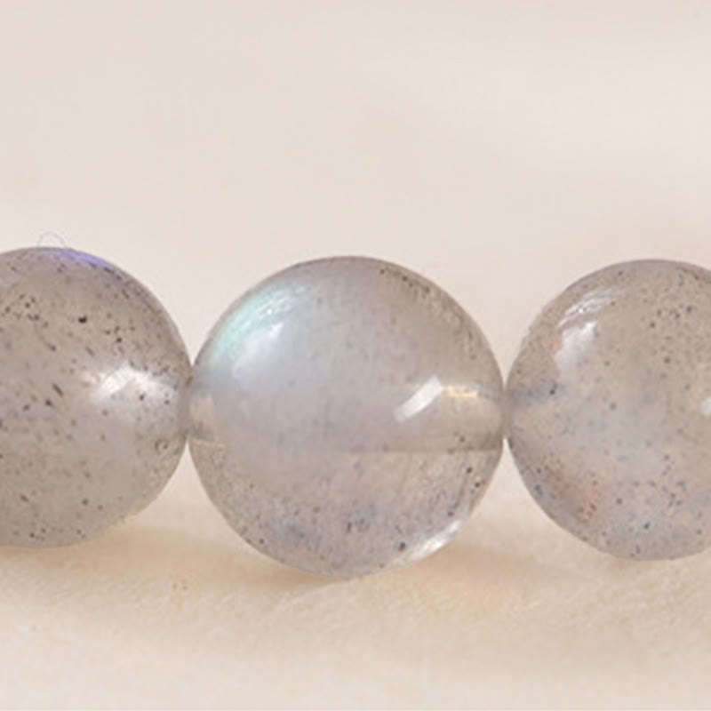 Natural Moonstone Lotus Bracelet – close-up moonstone bead texture and flash