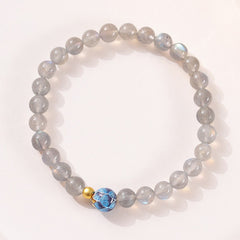 Natural Moonstone Lotus Bracelet – moonstone and blue lotus bead top-down, love