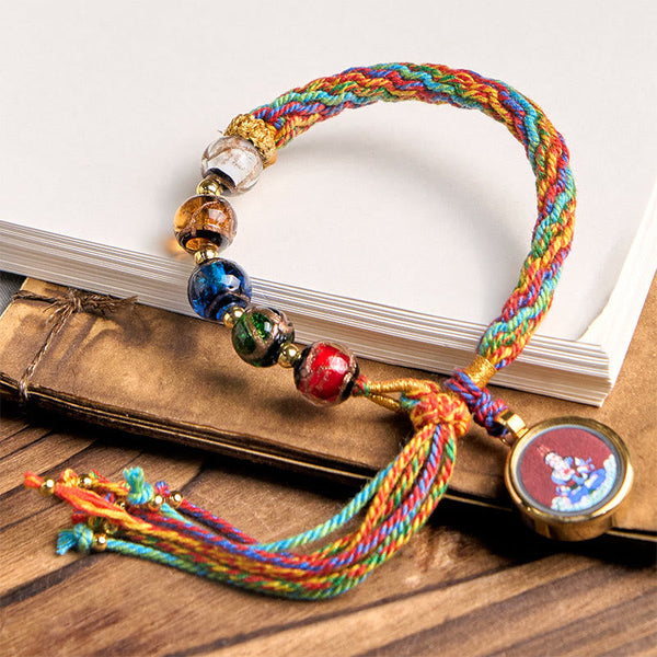 Zodiac Natal Buddha Cinnabar Bracelet – zodiac Buddha charm showing intricate, cinnabar bracelet, zodiac Buddha, red string