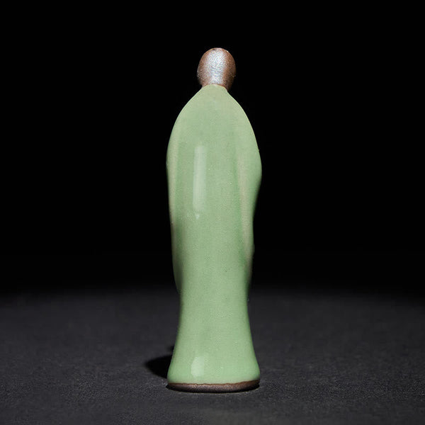 Meditation Monk Ceramic Statue – family room display with monk on side table, monk statue, serenity decor, ceramic figurine