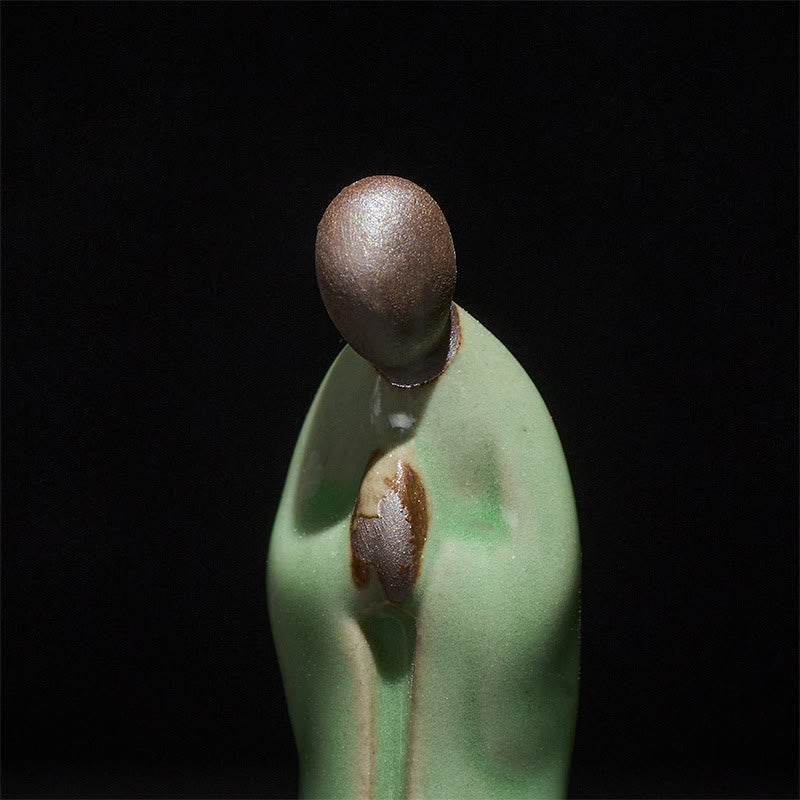 Meditation Monk Ceramic Statue – ceramic piece on mirrored surface reflecting, monk statue, serenity decor, ceramic figurine