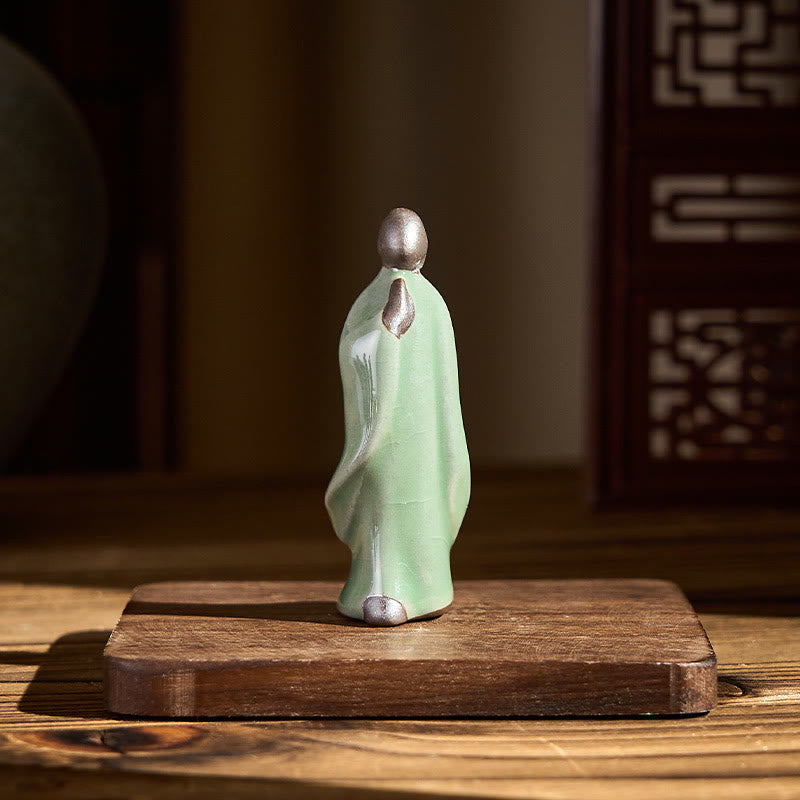 Meditation Monk Ceramic Statue – lifestyle shot of monk in cozy hygge interior, monk statue, serenity decor, ceramic figurine
