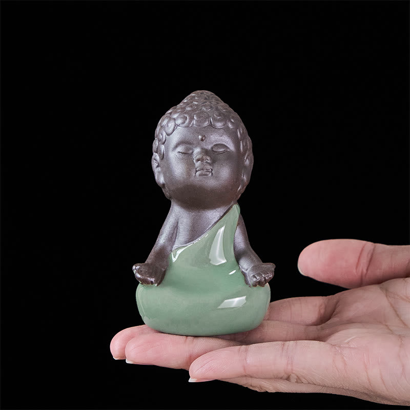 Prayer Meditation Resting Monk Statue – warm light highlighting monk peaceful, ceramic statue, zen gift, meditation decor