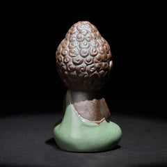 Prayer Meditation Resting Monk Statue – close-up of monk face showing peaceful, ceramic statue, zen gift, meditation decor
