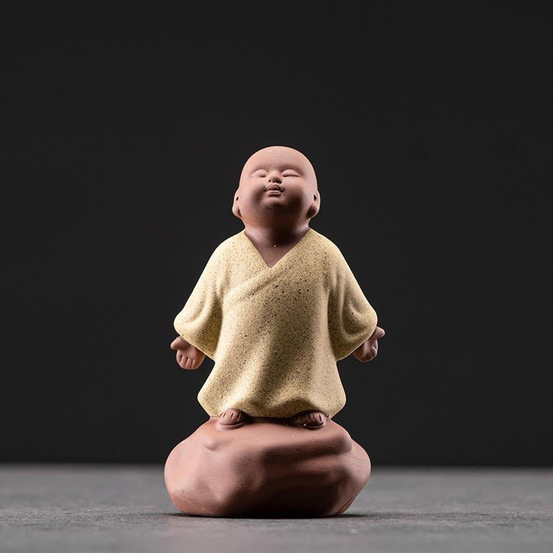 Looking Up Resting Monk Ceramic Home Decor – monk statue looking upward pose, contemplative ceramic sculpture