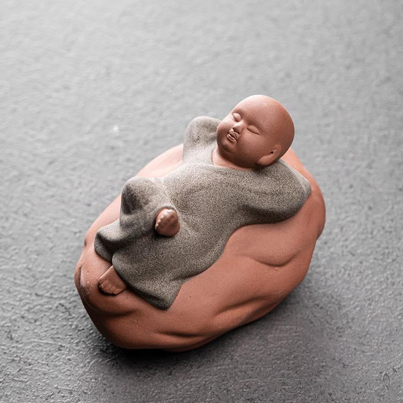 Looking Up Resting Monk Ceramic Statue Compassion Home Decor – statue with candle and stones, meditation space home decor
