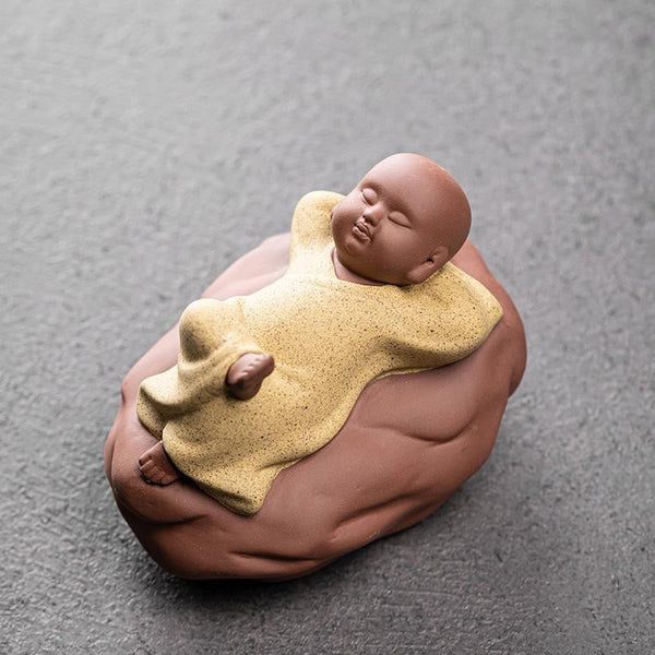 Looking Up Resting Monk Ceramic Statue Compassion Home Decor – looking up pose from low angle, hopeful monk sculpture