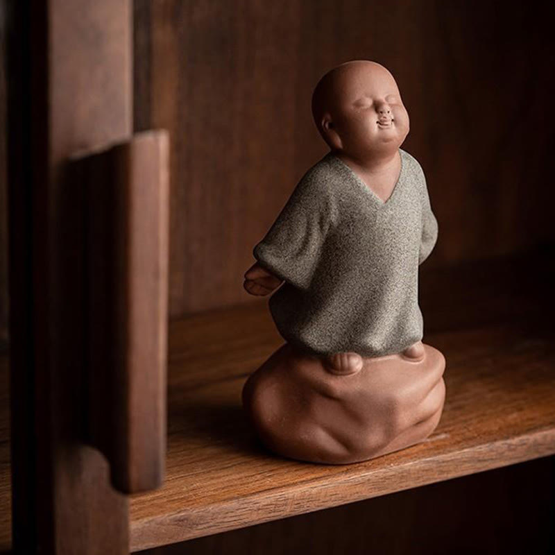 Looking Up Resting Monk Ceramic Statue Compassion Home Decor – monk face detail close-up, expressive ceramic art statue
