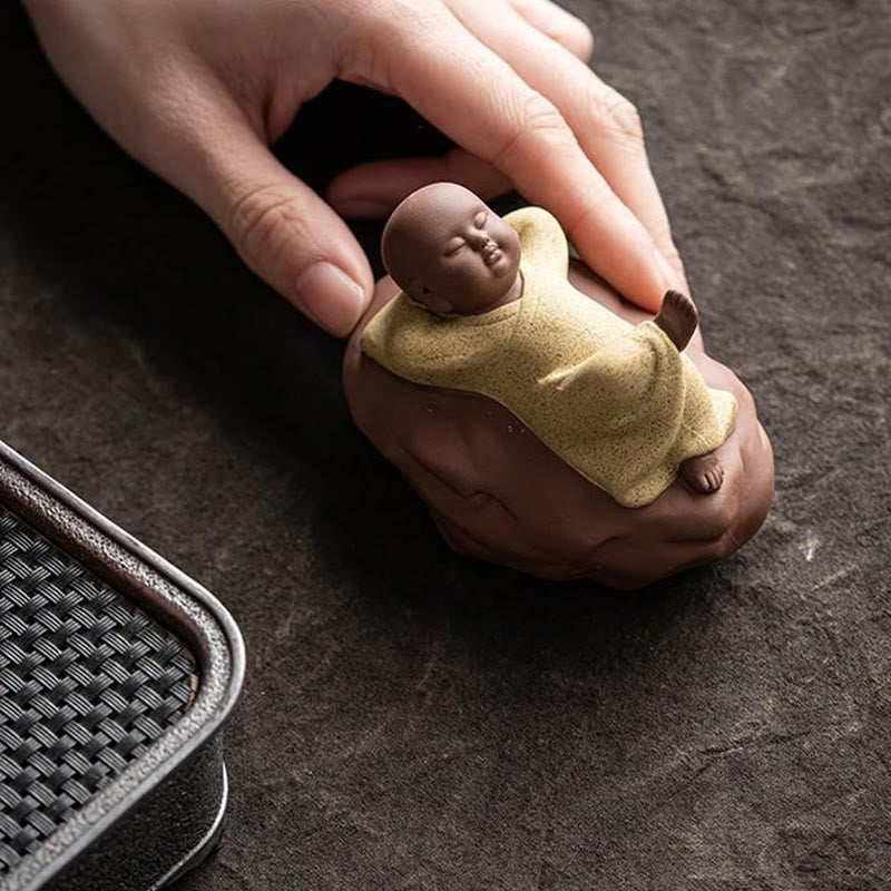 Looking Up Resting Monk Ceramic Statue Compassion Home Decor – earth tone ceramic finish, natural clay monk decoration