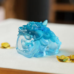 Handmade Liuli Crystal Gold Swallowing Pixiu – Blue liuli crystal Pixiu front view with gold ingots beside, wealth decor