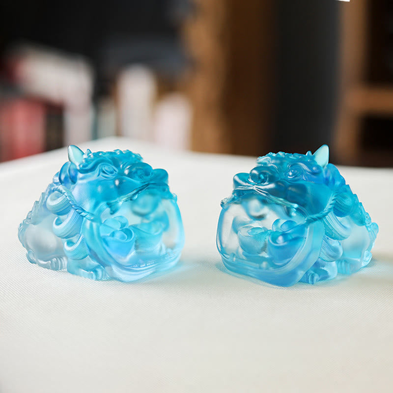 Handmade Liuli Crystal Gold Swallowing Pixiu – Pair of blue crystal Pixiu ornaments on white table, prosperity art set
