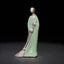 Ceramic Sweeping Monk Buddha Statue – celadon monk with broom three-quarter front, dark studio
