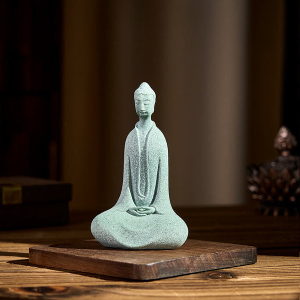 Sandstone Meditation Buddha Desk Statue – zen home display on wood base, golden ambient glow