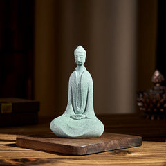 Sandstone Meditation Buddha Desk Statue – zen home display on wood base, golden ambient glow