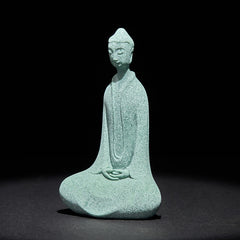 Sandstone Meditation Buddha Desk Statue – angled front view showing long robe folds, studio light